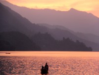 boating in phew lake in sun set